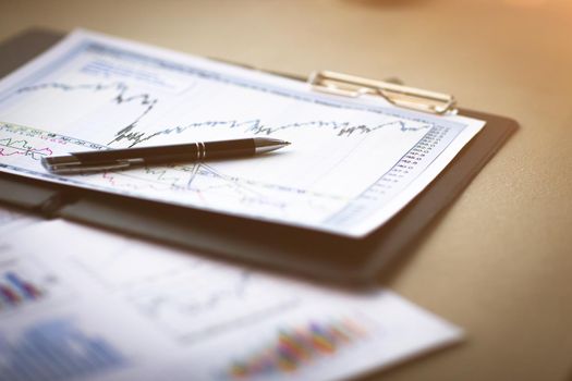 Drawings and charts of successful business, workplace of the businessman