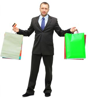 Happy shopping man. Isolated over white background