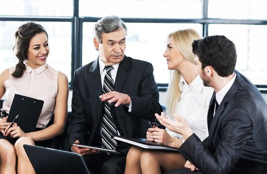 successful businessman and business team at a seminar in modern office
