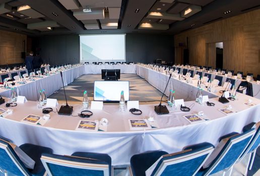 interior of big modern conference room before starting a business seminar