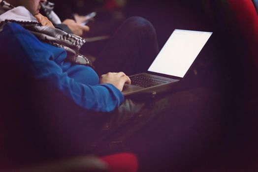 business people hands typing on laptop computer keyboard during the seminar at conference room