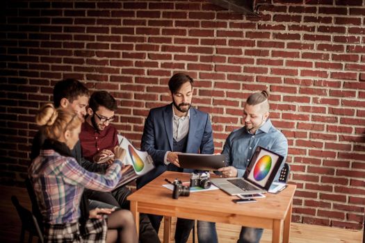 business team discussing new project workplace in a modern office. the photo has a empty space for your text