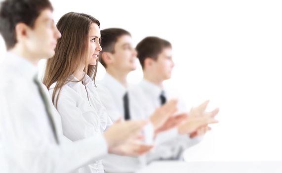 Happy business group applauding the company's success isolated on white background