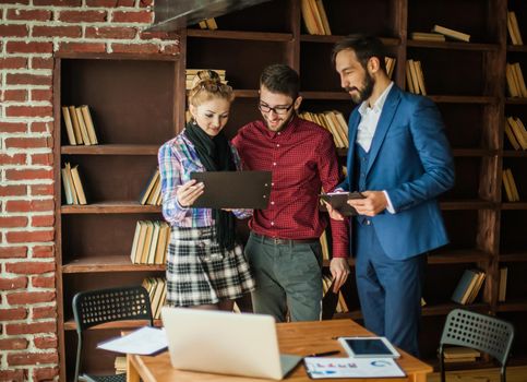 successful business team discussing the plan of work in a modern office