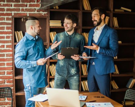 successful business team discussing the plan of work in a modern office