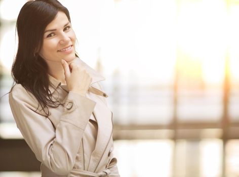 Portrait of a smiling successful business woman, there empty space for text