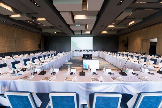 interior of big modern conference room before starting a business seminar