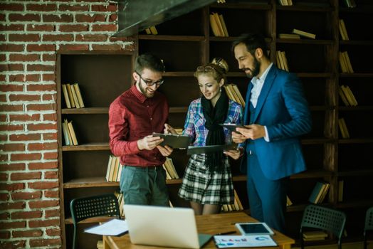 successful business team discussing the plan of work at the workplace in a modern office.the photo has a empty space for your text