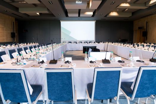 interior of big modern conference room before starting a business seminar