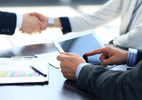 Businessman holding digital tablet