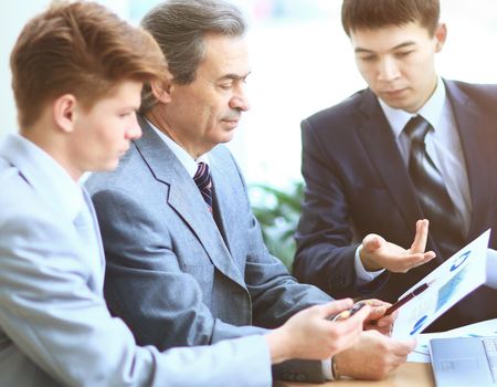 Business team working on their business project together at office