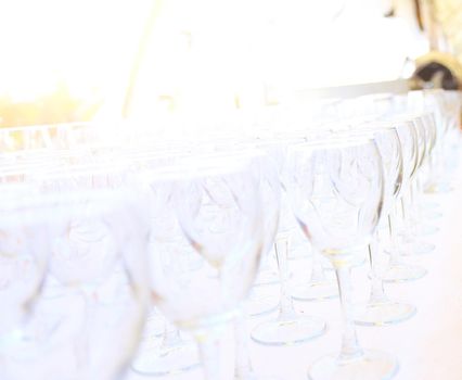 catering services background with snacks and glasses of wine on bartender counter in restaurant