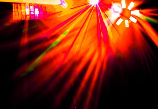 Lighting disco with bright beams of searchlight laser show.