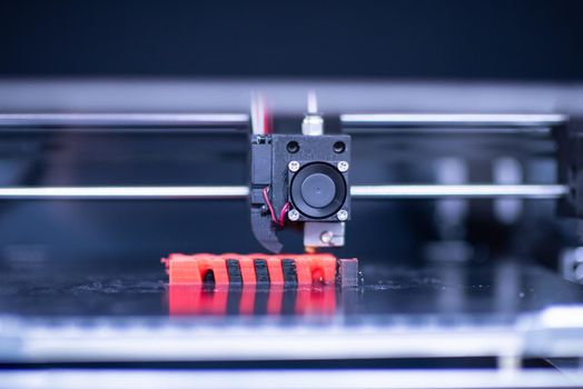 close up shot of 3D printer prints form figure
