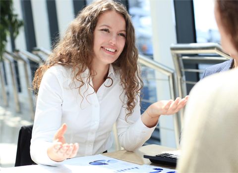 Closeup portrait of cute young business woman smiling