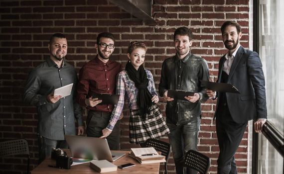 successful business team near the workplace in modern office