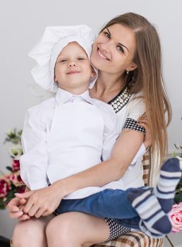 mother and daughter cooking dinner in the kitchen