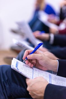 young people taking notes on education training  business seminar at modern conference room