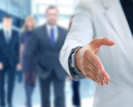 Midsection of a businesswoman with an open hand ready to seal a deal