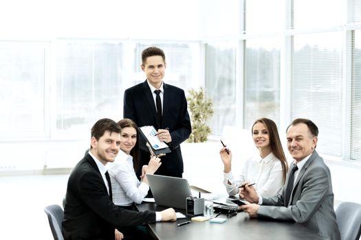 successful businessman and his business team meeting in a modern office