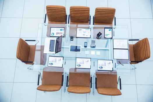 top view -equipped Desk for the business meeting business partner in modern meeting room. the photo is a blank space for your text