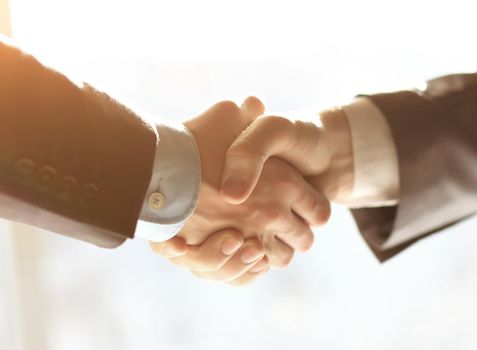 Business people shaking hands, finishing up a meeting