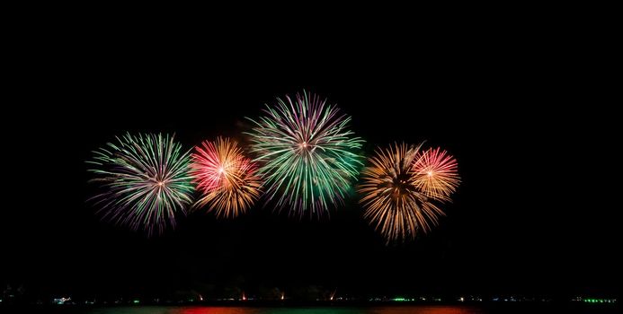 Fireworks at the sea in night time for celebration of new years