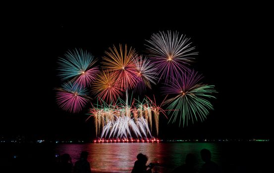 Fireworks at the sea in night time for celebration of new years