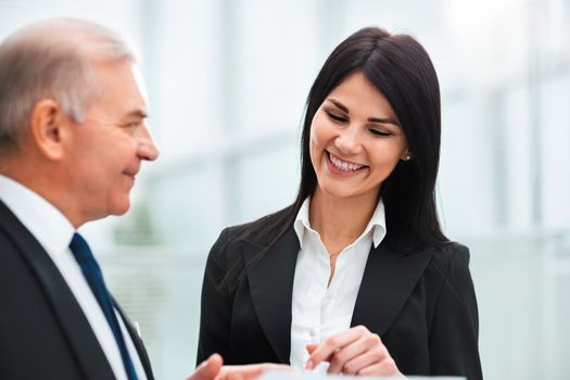 close up. businessman discussing a business document with a consultant. business concept