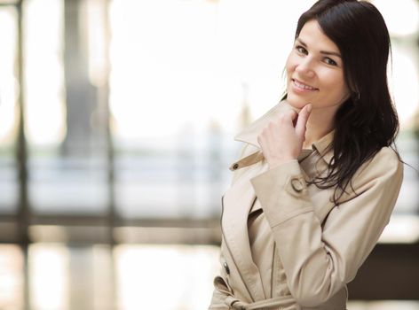 Successful business woman on a background of a spacious office.photo has empty space for your text