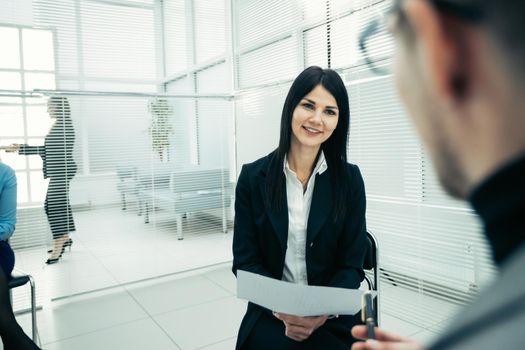 female investment consultant analyzing a financial report. working with documents .