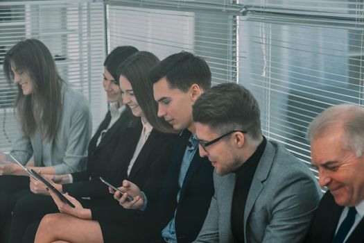 close up. image of a group of candidates waiting for an interview