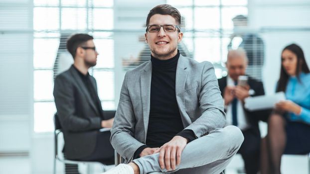 close up. financial consultant sitting in a modern office. work with documents