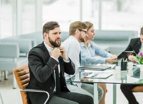 sales Manager and business team are working with financial reports at the workplace in the office.the photo has a empty space for your text