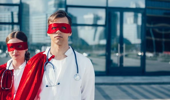 close up. doctors are superheroes standing on a city street . photo with a copy-space.