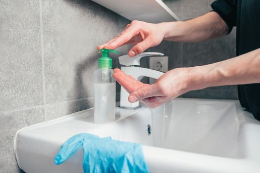 close up. casual man washes his hands thoroughly . concept of prevention of infectious diseases.