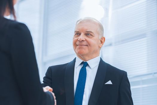 close up. businessman discussing a business document with a consultant. business concept