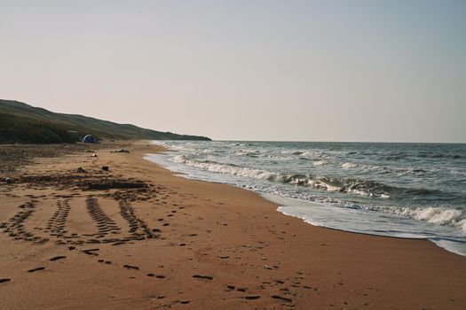 Waves beach sand landscape ocean summer travel. High quality photo