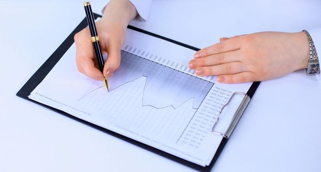Business woman working with documents in the office