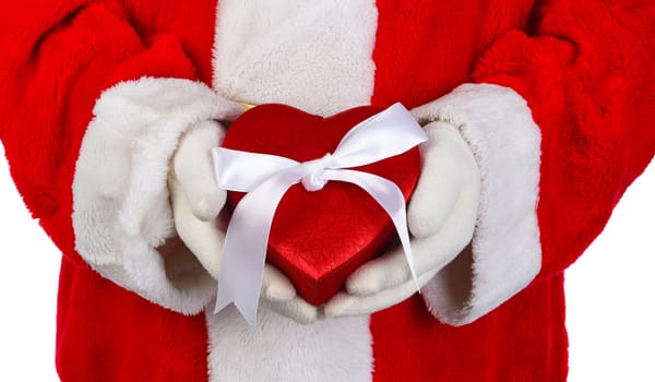 Closeup Santa Claus holding a red Valentines Heart shaped box in front of his torso.,