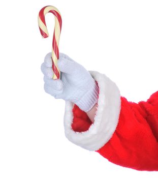 Closeup of Santa Claus holding an old fashioned candy cane in his fingers isolated on white. Hand and sleeve only.