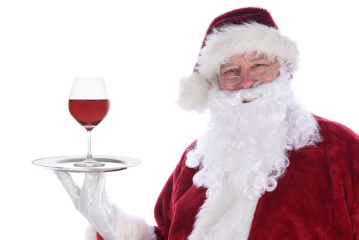Santa Claus holding silver platter with a single red wine glass isolated on white.