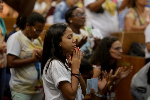 salvador, bahia, brazil - october 13, 2019: Devotees of Santa Dulce of the Poor are seen during mass at the Santa Sanctuary in the city of Salvador.