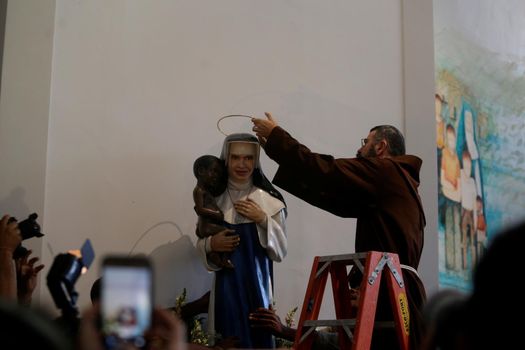 salvador, bahia, brazil - october 13, 2019: return of the nun Santa Dulce dos Pobres seen with the sculpture of the saint in the sanctuary in the city of Salvador.