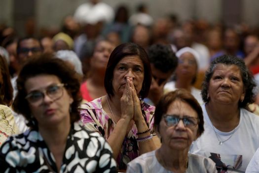 salvador, bahia, brazil - october 13, 2019: Devotees of Santa Dulce of the Poor are seen during mass at the Santa Sanctuary in the city of Salvador.