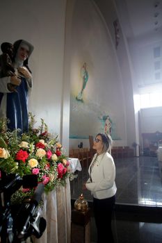 salvador, bahia, brazil - october 13, 2019: return of the nun Santa Dulce dos Pobres seen with the sculpture of the saint in the sanctuary in the city of Salvador.