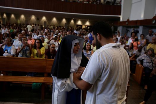 salvador, bahia, brazil - october 13, 2019: woman wears the clothes of a Santa Dulce dos Pobres nun during a theatrical presentation at the sanctuary of the saint in Salvador