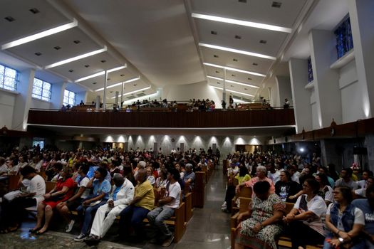 salvador, bahia, brazil - october 13, 2019: Devotees of Santa Dulce of the Poor are seen during mass at the Santa Sanctuary in the city of Salvador.