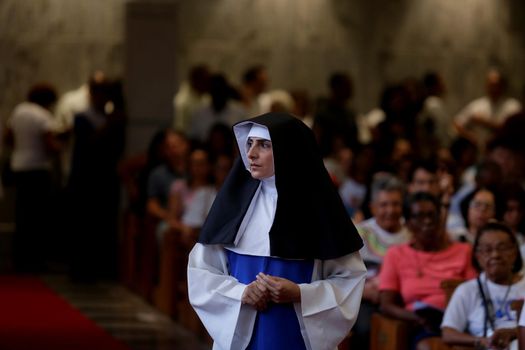 salvador, bahia, brazil - october 13, 2019: woman wears the clothes of a Santa Dulce dos Pobres nun during a theatrical presentation at the sanctuary of the saint in Salvador