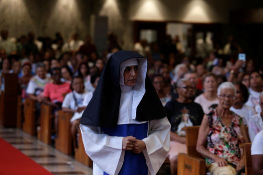 salvador, bahia, brazil - october 13, 2019: woman wears the clothes of a Santa Dulce dos Pobres nun during a theatrical presentation at the sanctuary of the saint in Salvador